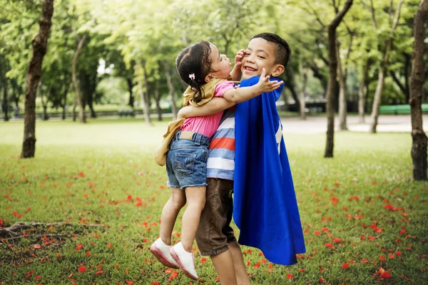 Brother Sister Playing at park