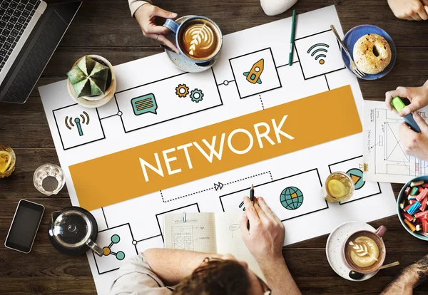 Table with poster with Network