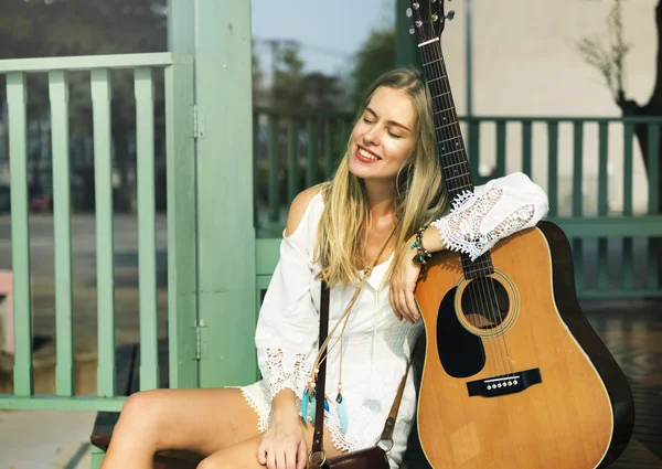 Girl holding Guitar