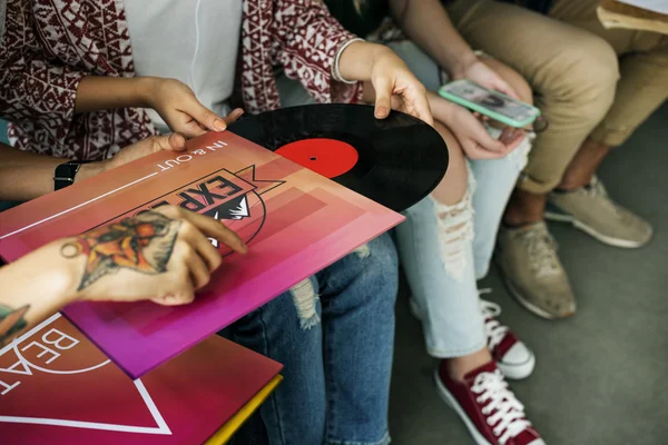 Young people with vinyl record