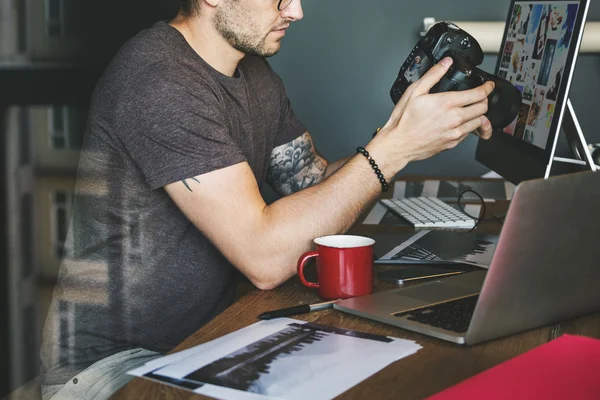 Man working with  camera