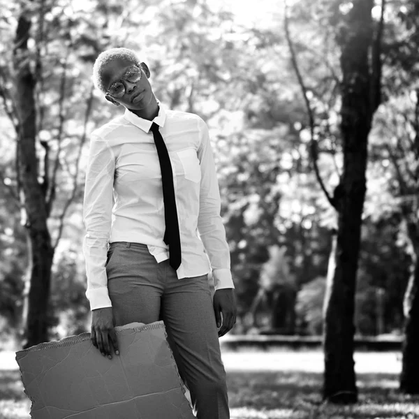 Businesswoman with empty Blank standing in the park