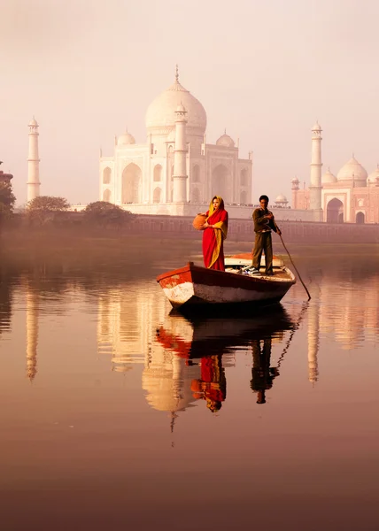 Indian man and woman on boat