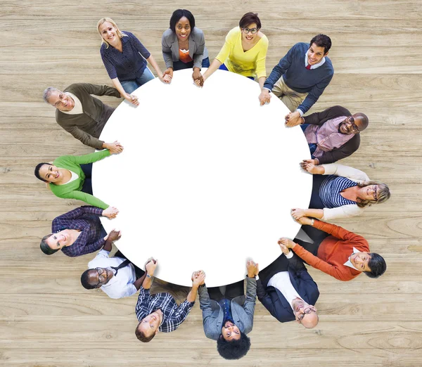 People Forming Circle Holding Hands