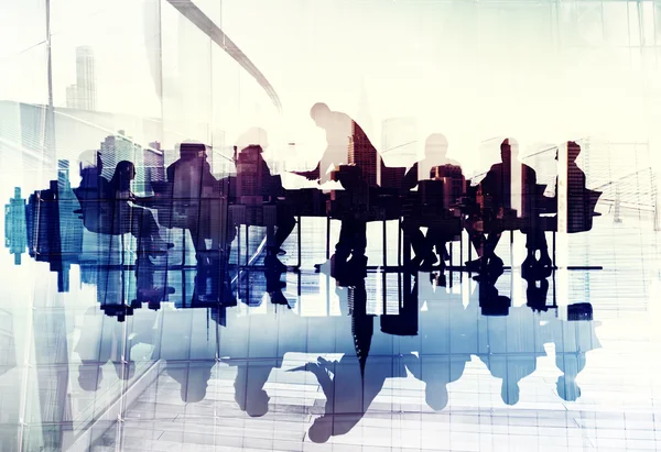 Business People\'s Silhouettes in Meeting