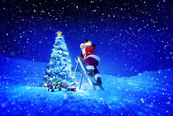 Santa with lamp on step-ladder
