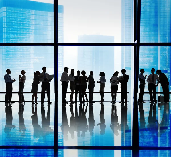 Silhouettes of Business People Meeting Concept