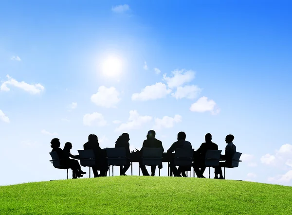 Business people having an outdoor meeting