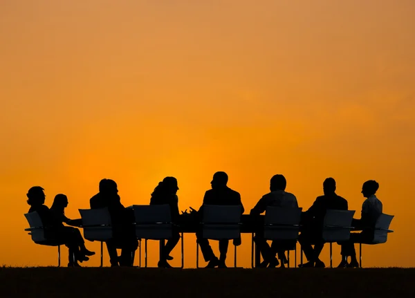 Business People in Meeting Outdoors