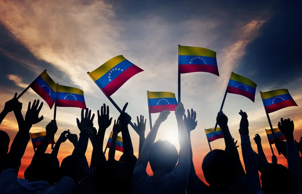 People Waving Venezuelan Flags