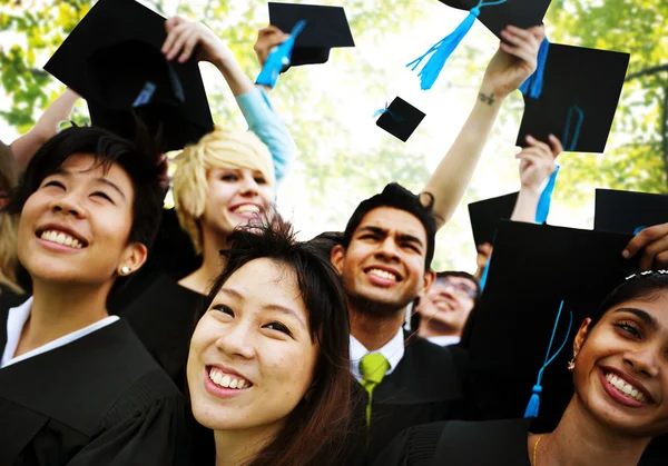 Students Celebrating Graduation Concept