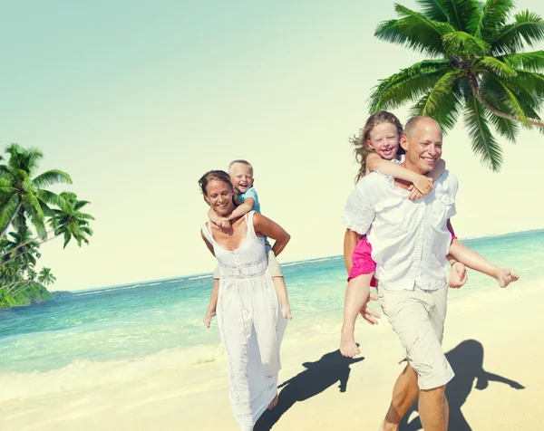 Happy Family looking Playful at Vacation Concept
