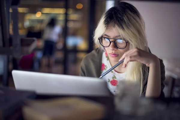 Businesswoman working on laptop computer