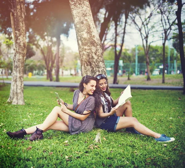 Female students studying in park