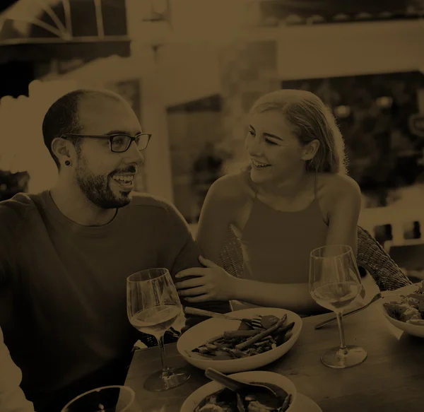 Man and woman drinking wine