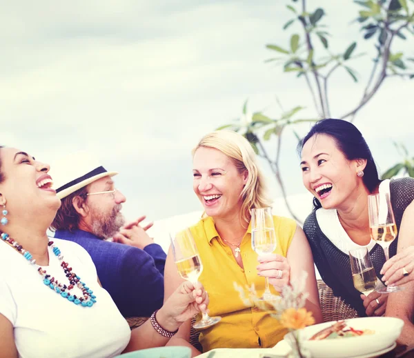 Friends hanging out on party at rooftop restaurant