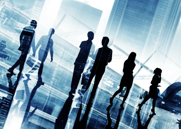 Silhouettes of Business People Walking