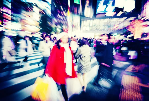 People walking across street