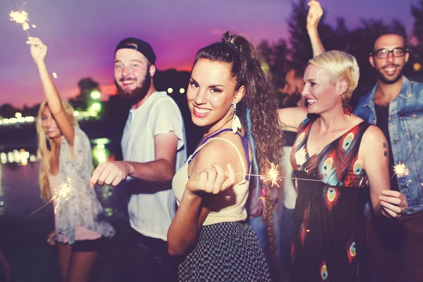 Friends hanging out at outdoors party