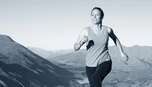 Woman jogging in mountains