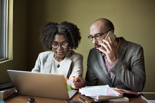 Business partners working together in office