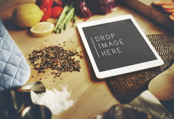 Digital tablet on kitchen table