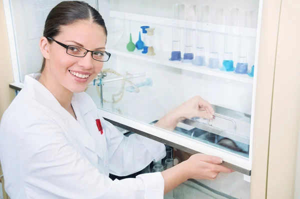 Young woman scientist working at the laboratory