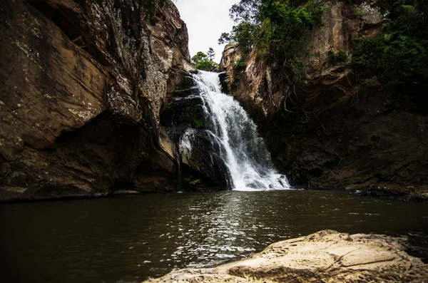 Chattrakan Waterfall in Thailand water fall in deep forest at border of Phitsanulok province Thailand .