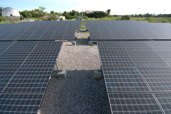 Solar panels in a row on Thailand electric plant .