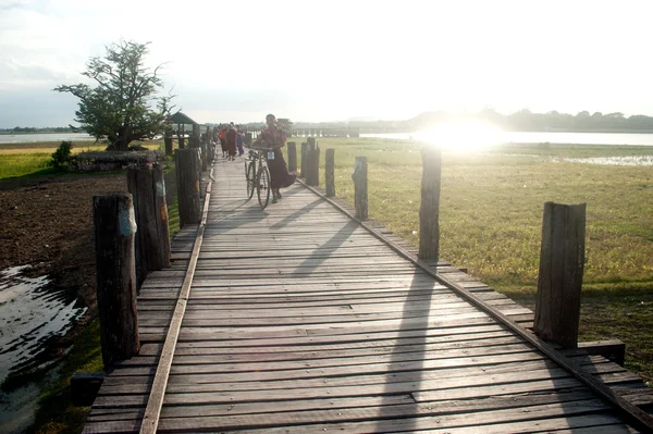 Residents and visitors traveling on the U-Bein Bridge,Myanmar.