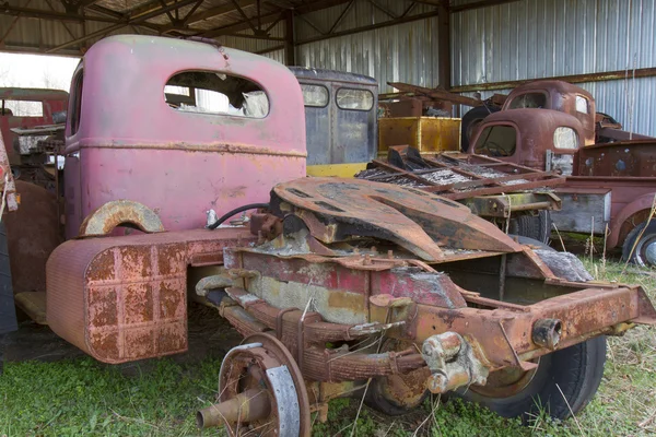 Old trucks in shed