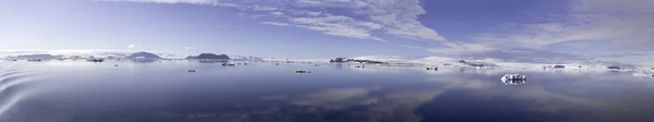 Clouds reflecting in calm waters of Antarctic Sound