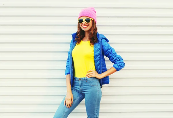 Portrait fashion pretty smiling woman model in colorful clothes