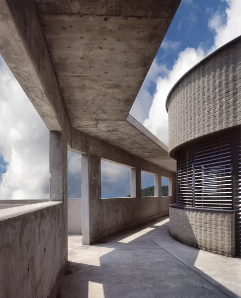 Modern architecture in concrete in the clouds