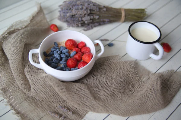 The mess in the background with berries wood.