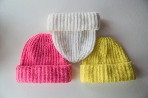 Collection of knitted caps isolated