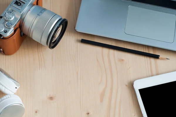 Office desk with  Technology Equipment Notebook, tablet, Camera,