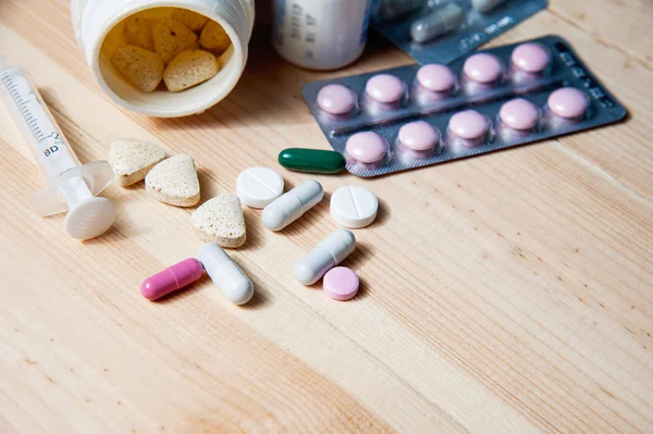 Syringe and medications pills drug