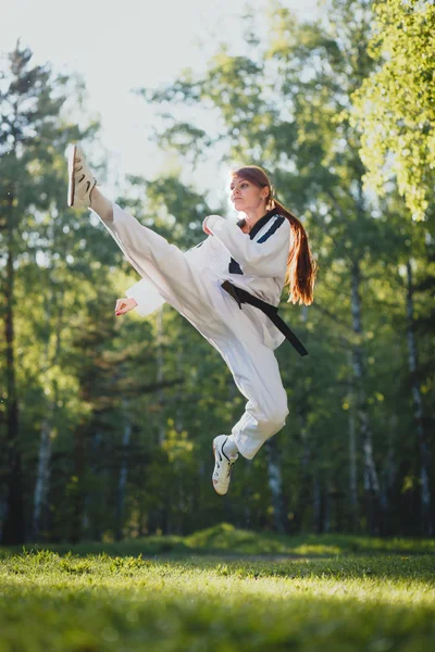 Karate woman practice martial art outdoor