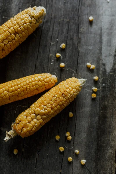 Vintage Corn on the Cob on old background wood