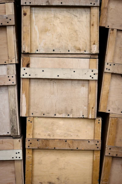 Lots of plywood boxes with handles