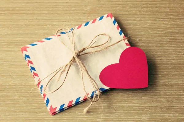 Vintage envelopes and paper heart