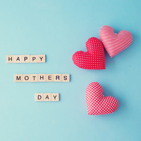 Happy mother's day card and hearts