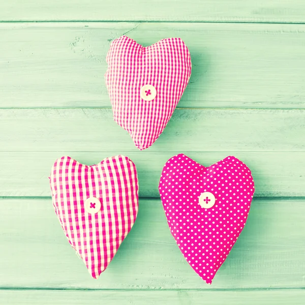 Vintage patterned sewn hearts