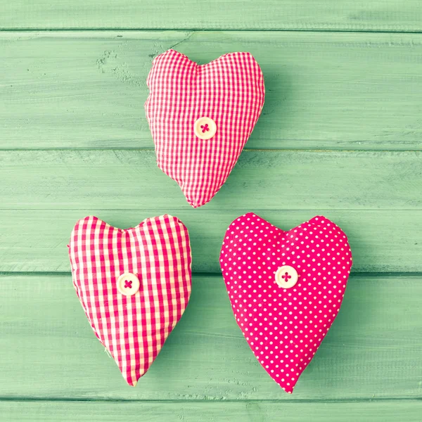 Vintage patterned sewn hearts