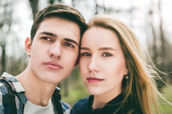 Close up portrait of attractive young  couple outdoors