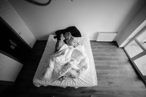 Man and woman on the bed