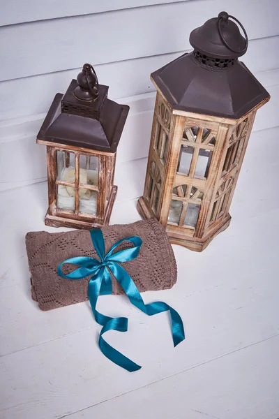 The composition of two wooden and glass street lantern