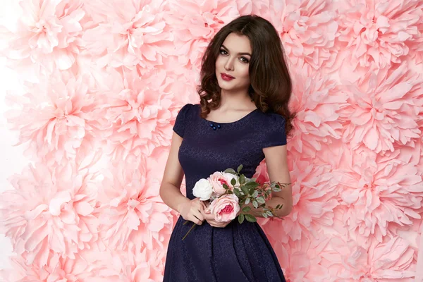 Beautiful sexy woman in dress many flowers makeup summer spring