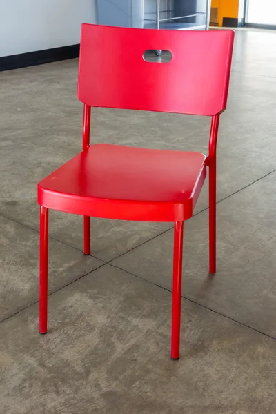 Red Chair inside a modern ski lodge